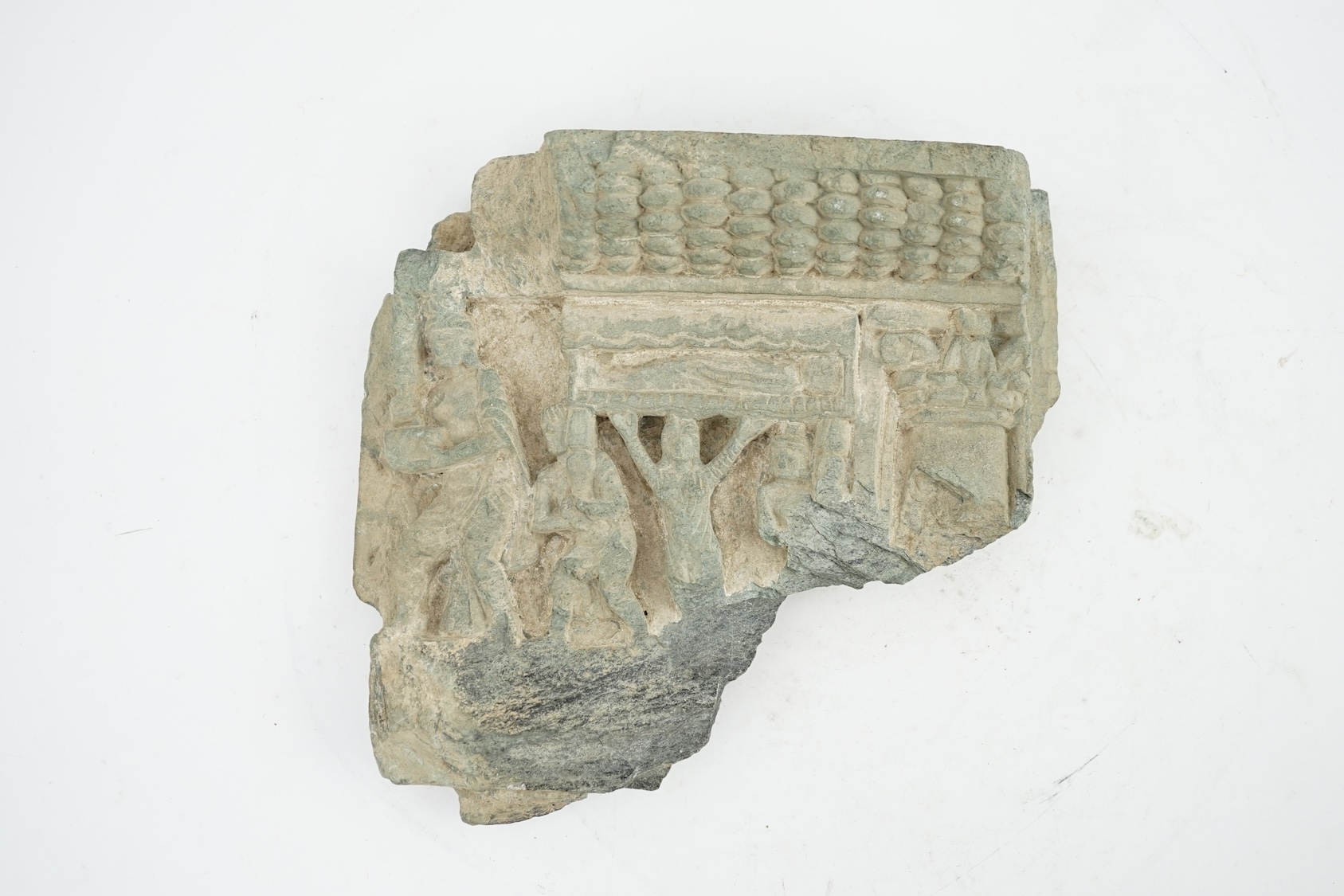 A Gandharan green schist relief fragment, probably 2nd/3rd century AD